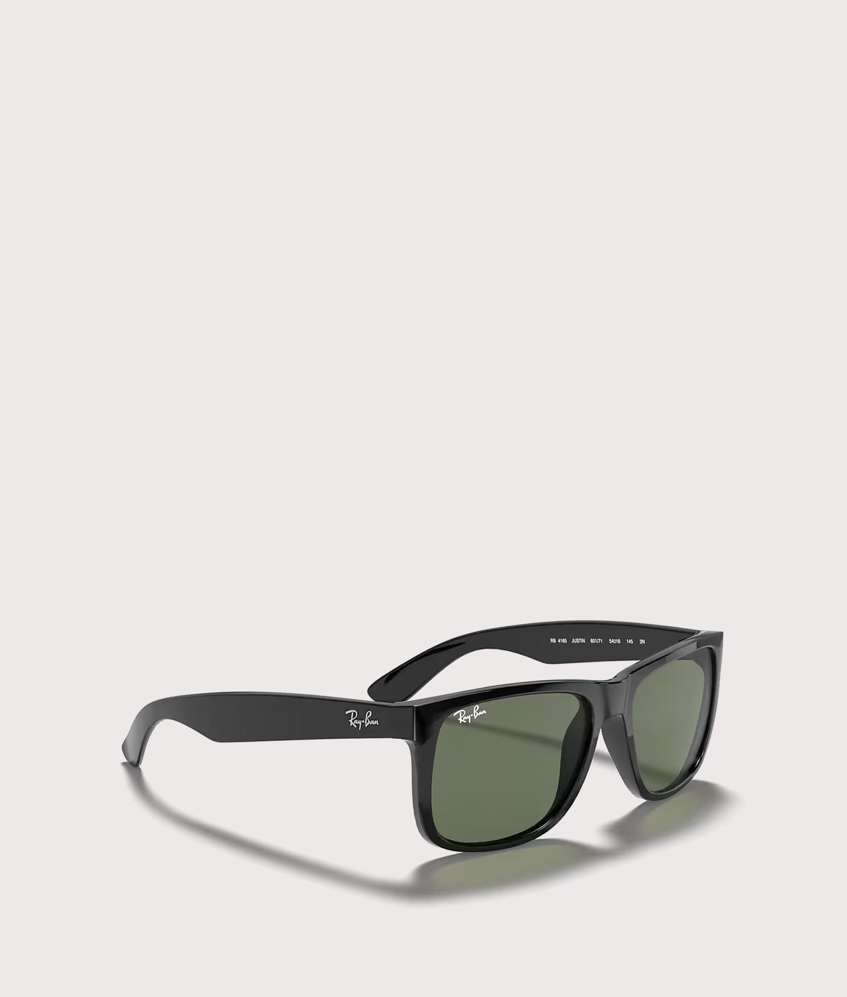 Justin Classic Sunglasses in Polished Black Dark Green Lenses by Ray-Ban. Shot by EQVVS. Angled Detail Shot.
