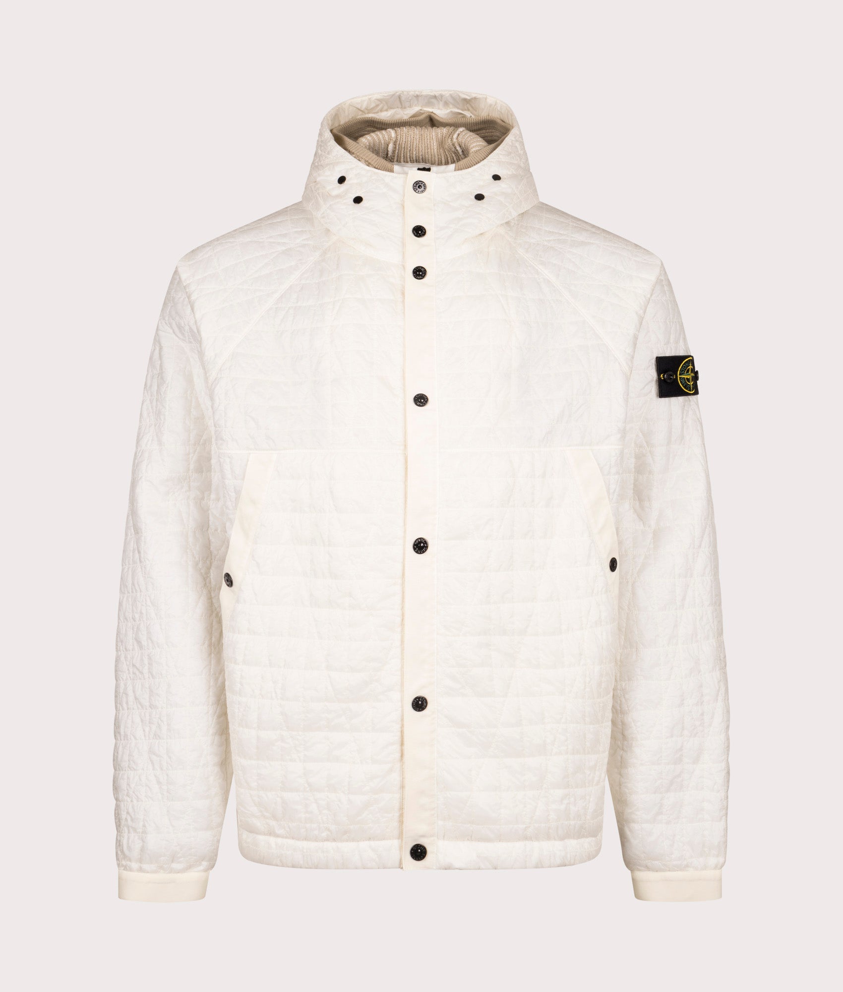 Stone Island Crinkles Reps NY Quilted-TC Jacket in Ivory at EQVVS Menswear. Front shot with insert.