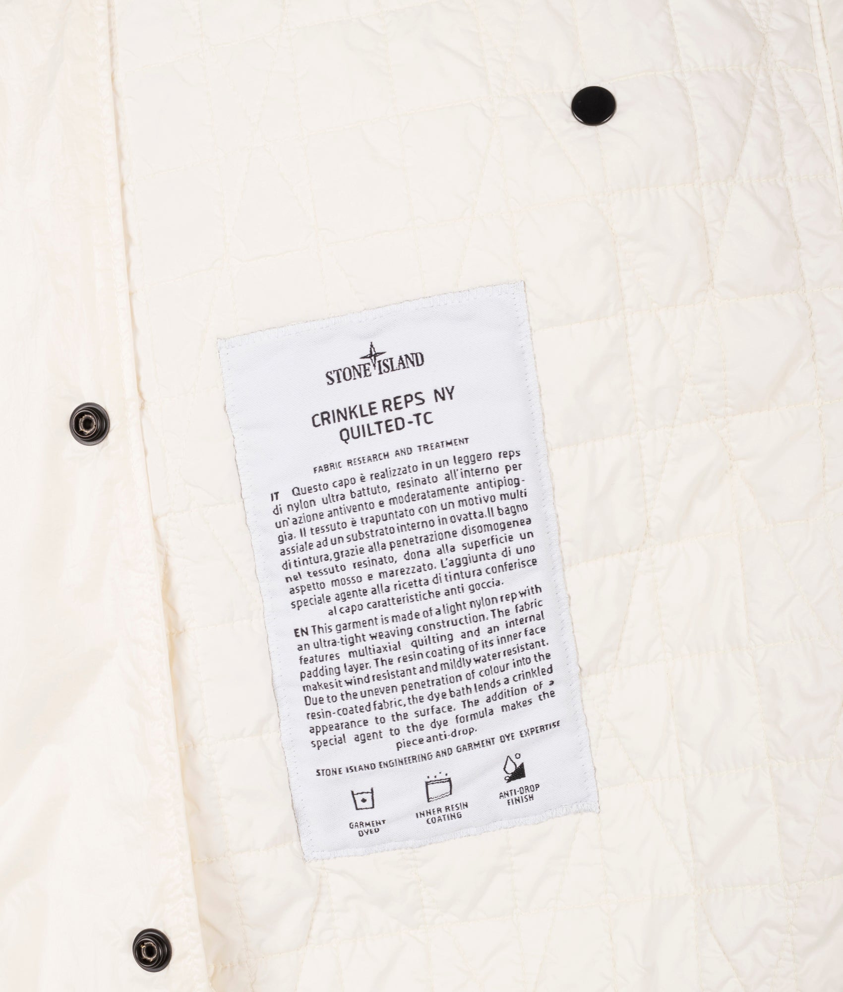 Stone Island Crinkles Reps NY Quilted-TC Jacket in Ivory at EQVVS Menswear. Inside tag shot.