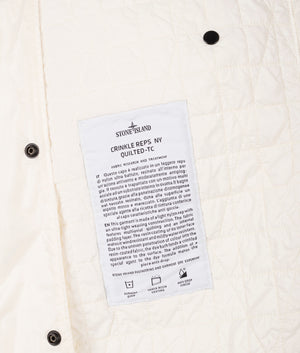 Stone Island Crinkles Reps NY Quilted-TC Jacket in Ivory at EQVVS Menswear. Inside tag shot.