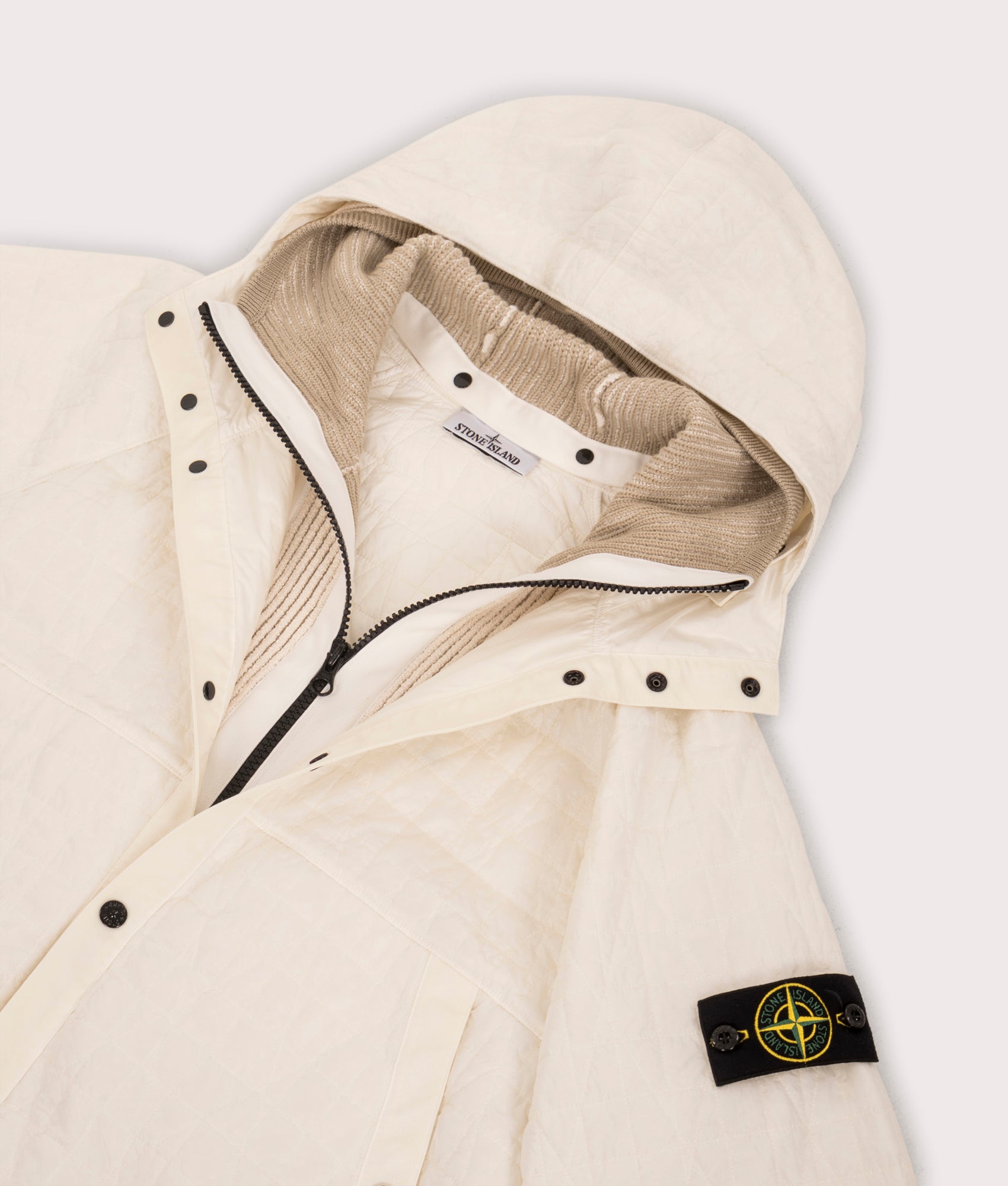 Stone Island Crinkles Reps NY Quilted-TC Jacket in Ivory at EQVVS Menswear. Front close up shot.