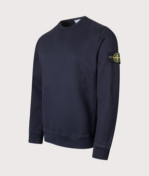 Brushed Organic Cotton Sweatshirt in Dark Navy. 100% Cotton | Stone Island | Shot at EQVVS | Front angle shot 