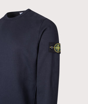 Brushed Organic Cotton Sweatshirt in Dark Navy. 100% Cotton | Stone Island | Shot at EQVVS | Front angle detail shot 