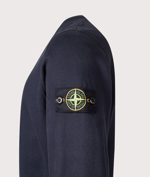 Brushed Organic Cotton Sweatshirt in Dark Navy. 100% Cotton | Stone Island | Shot at EQVVS | Side detail shot 