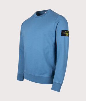 Organic Cotton Crewneck Sweatshirt in Steel Blue. 100% Cotton | Stone Island | Shot at EQVVS | Front angle shot