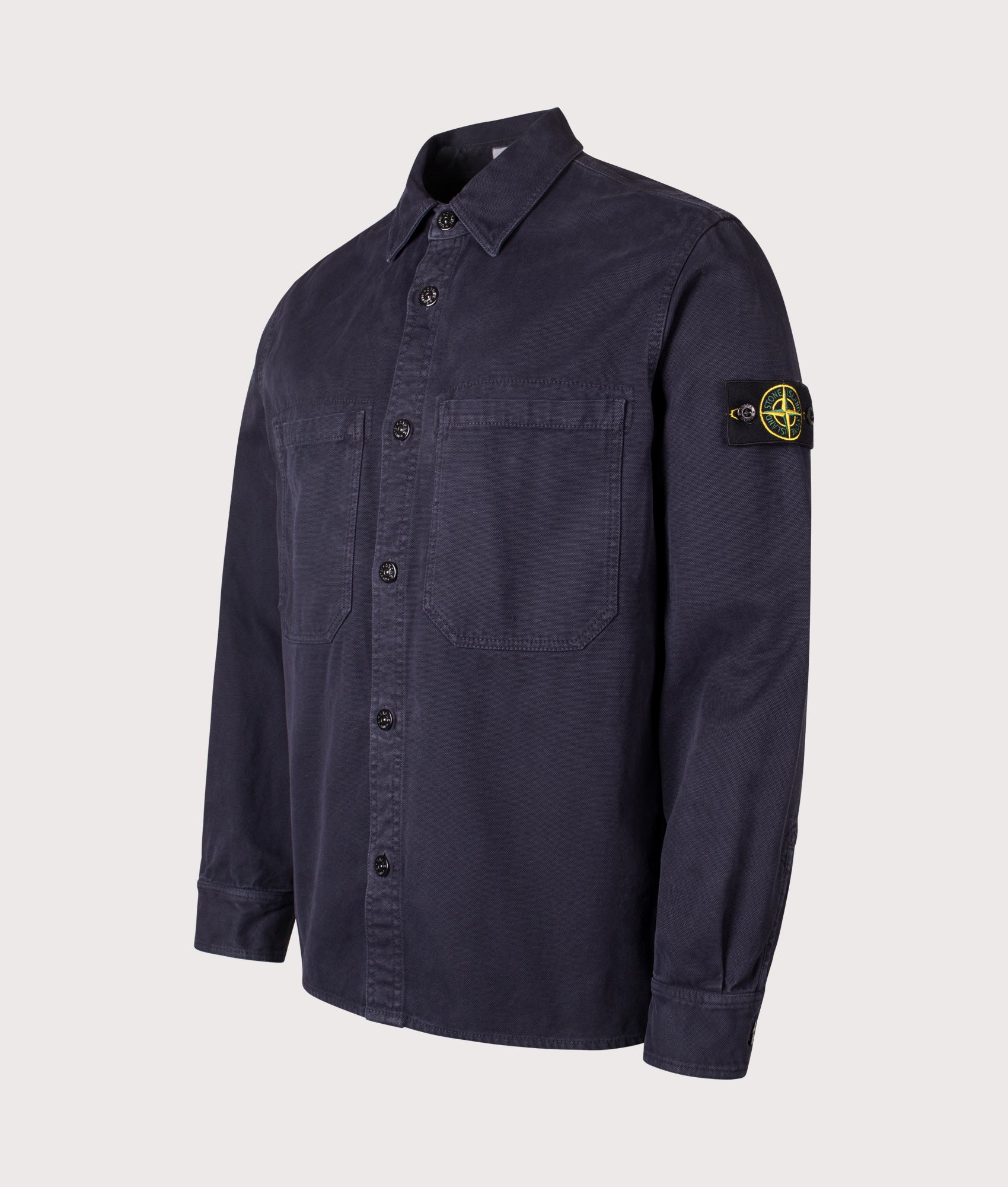 Stone Island Overshirt in the Ink Blue at EQVVS Menswear. Angled front shot.