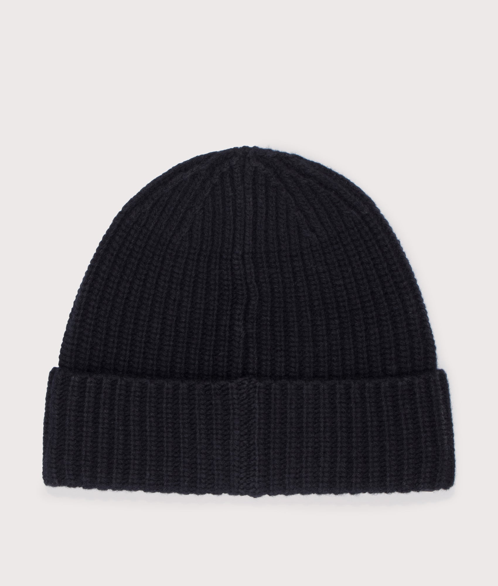 Wool Knit Beanie in Black . 100% Virgin Wool | Stone Island | Shot at EQVVS | Back shot 