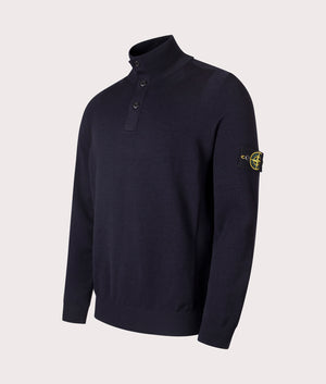 Stone Island Button Neck Reverse Stitch Jumper in Navy Blue at EQVVS Menswear. Angled front shot.