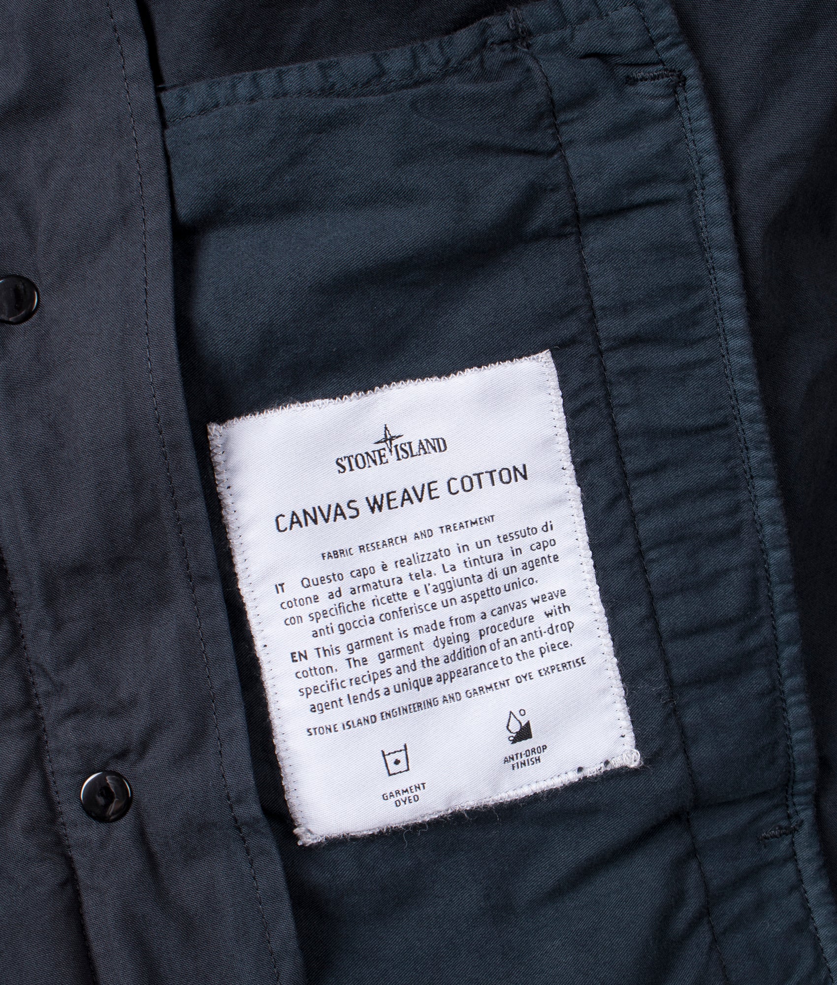 Canvas Weave Hooded Field Jacket in Navy Blue | 100% Cotton | Stone Island | EQVVS | Label shot 