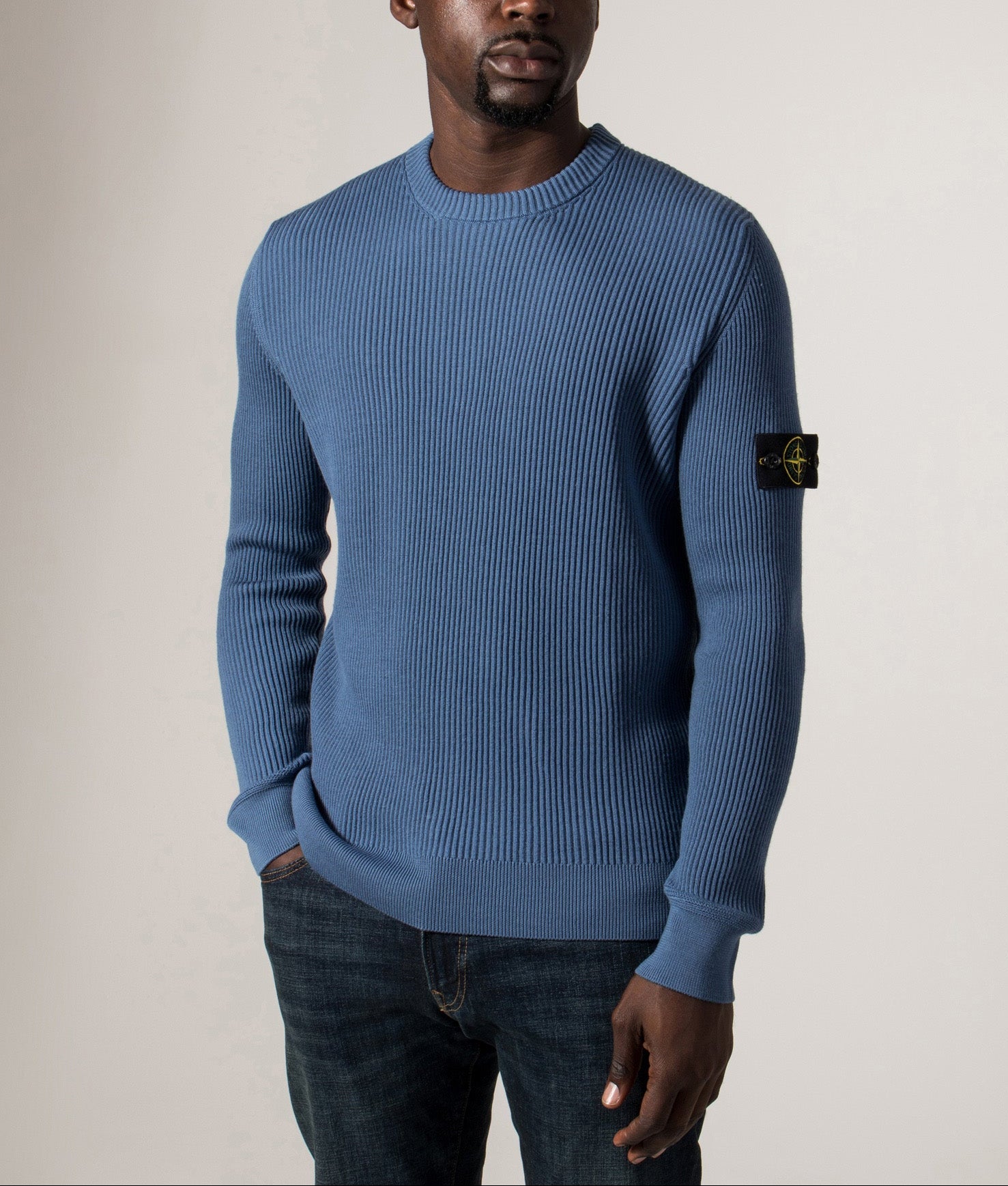 Crew Neck in Steel Blue. 100% Virgin Wool | Stone Island | Shot at EQVVS | Front model shot 