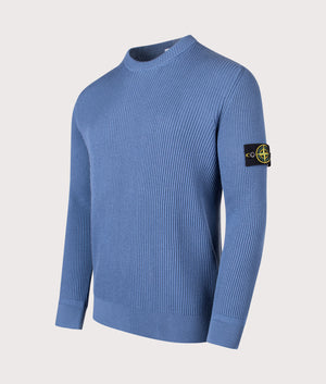 Crew Neck in Steel Blue. 100% Virgin Wool | Stone Island | Shot at EQVVS | Side angle shot 