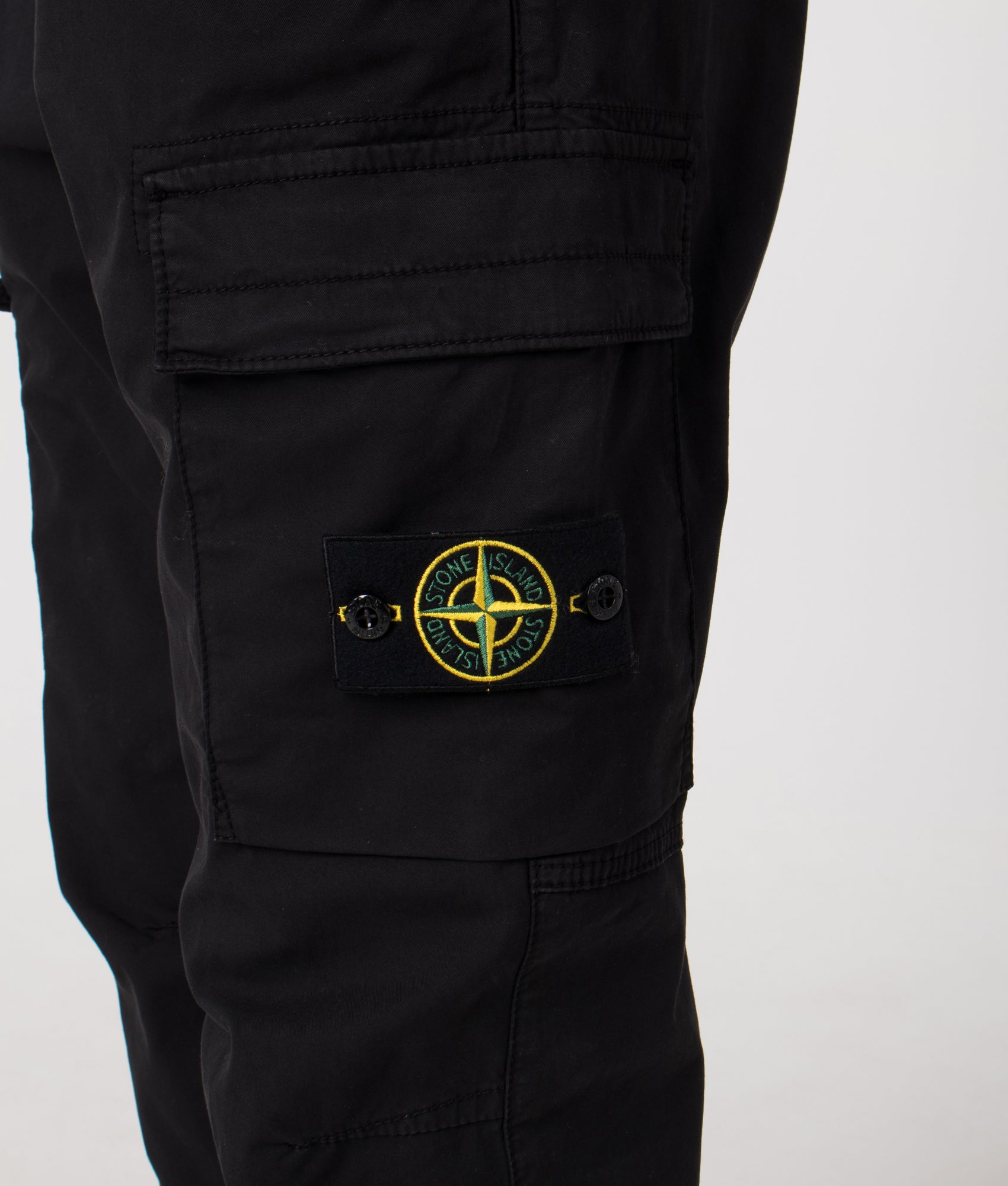 Regular Fit Tapered Cargo Trouser in Black | Cotton | Stone Island | EQVVS | Detail shot 