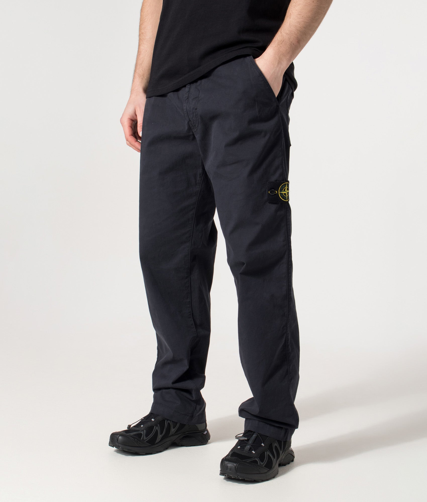 Stone Island Trousers in the Navy Blue at EQVVS Menswear. Angled model front shot.
