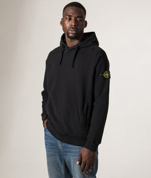 Brushed Organic Cotton Hoodie in Black. 100% Organic Cotton | Stone Island | Shot at EQVVS | Model angle shot 