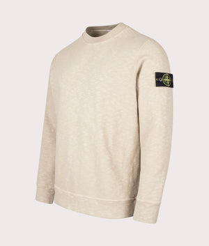 Stone Island Vanisé Brushed Heavy Cotton Sweatshirt in Desert at EQVVS Menswear. Angled front shot. 
