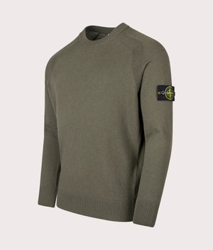 Stone Island Geelong Wool Jumper in Military Green at EQVVS Menswear. Angled front shot. 