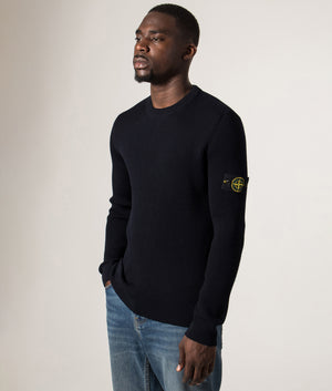 Wool Crew Neck Jumper in Navy Blue. 100% Virgin Wool | Stone Island | Shot at EQVVS | Front model angle shot 