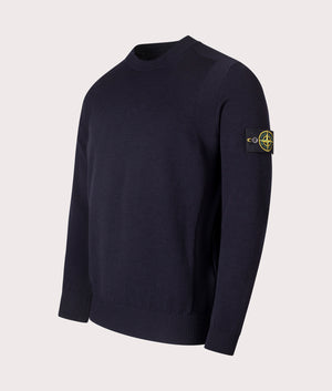 Stone Island Stretch RWS Wool Jumper in Navy Blue at EQVVS Menswear. Angled front shot.