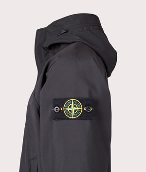 Hooded Soft Shell Jacket  in Black. | Stone Island | Shot at EQVVS | Side detail shot 
