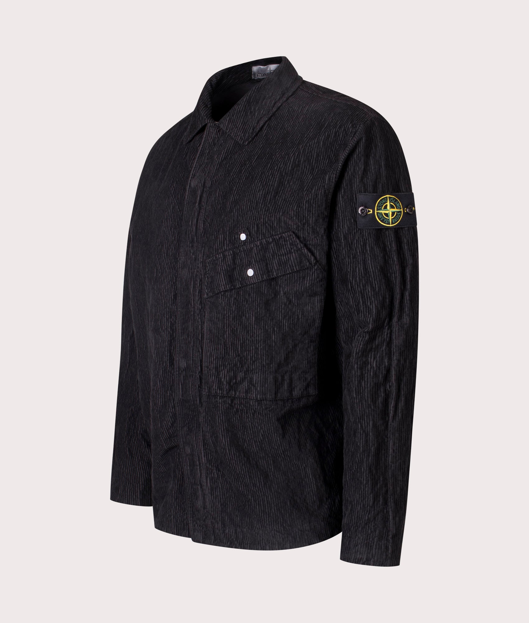 Stone Island Wrinkled Corduroy 500-TC Overshirt in Black at EQVVS Menswear. Angled front shot. 