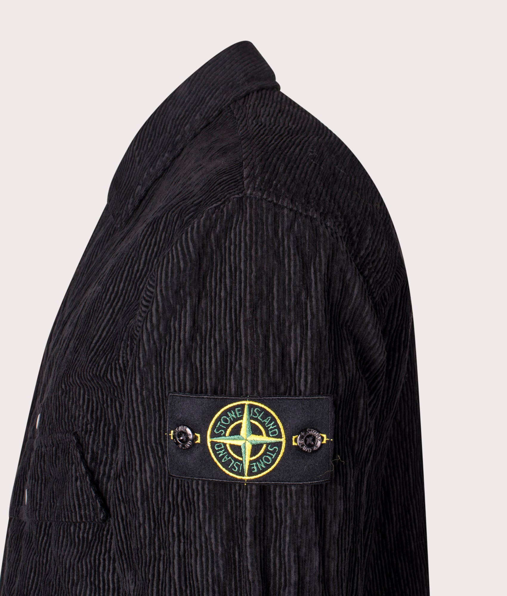 Stone Island Wrinkled Corduroy 500-TC Overshirt in Black at EQVVS Menswear. Side detail shot.