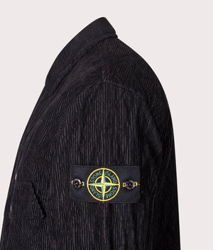 Stone Island Wrinkled Corduroy 500-TC Overshirt in Black at EQVVS Menswear. Side detail shot.