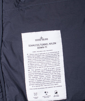 Stone Island Seamless Tunnel Nylon Down TC Jacket in Navy Blue at EQVVS Menswear. Inside label detail shot.