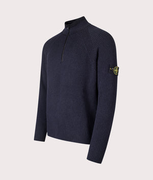Stone Island Vanisé Rib RWS Wool Quarter Zip Jumper in Navy Blue at EQVVS Menswear. Angled front shot. 