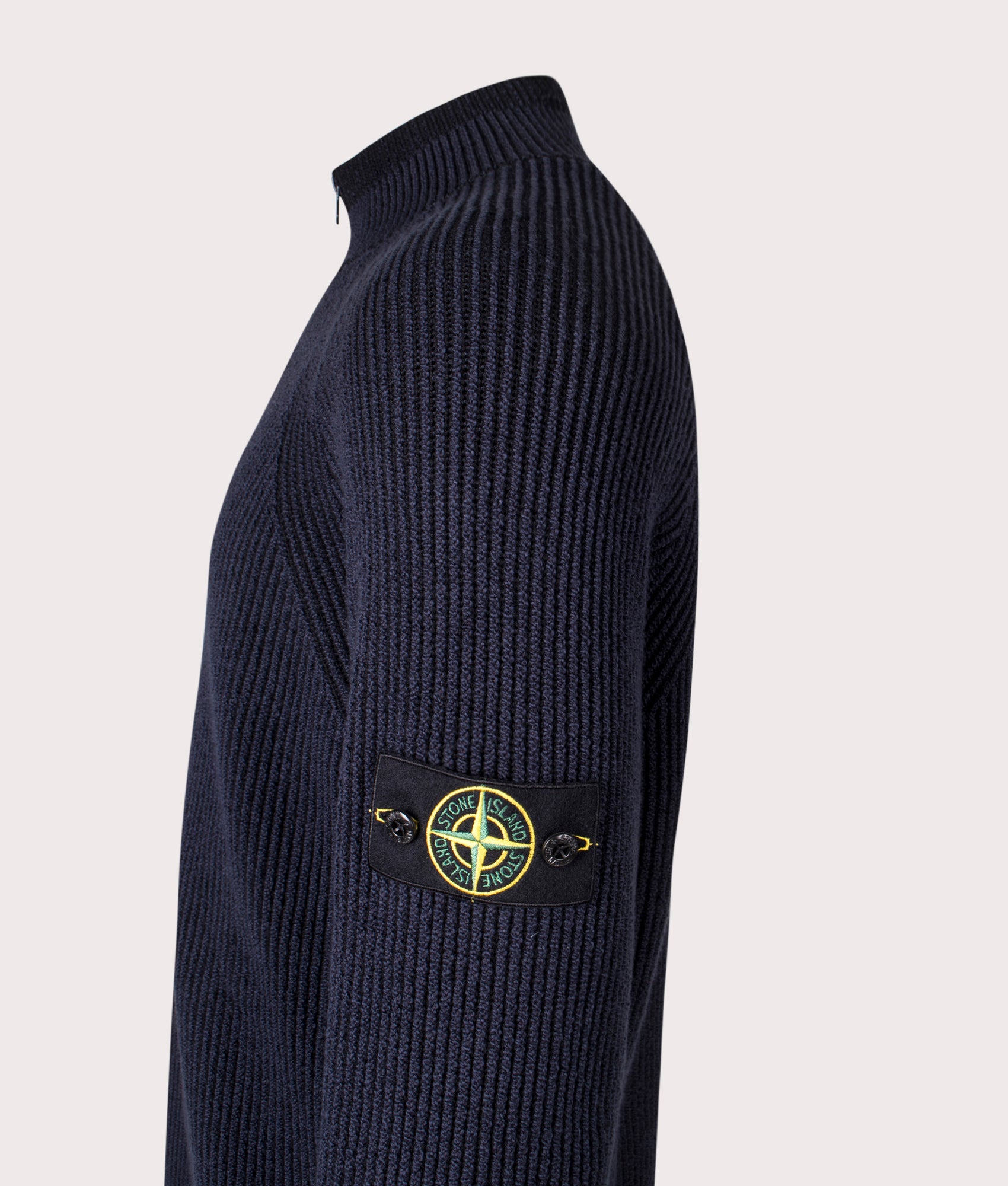 Stone Island Vanisé Rib RWS Wool Quarter Zip Jumper in Navy Blue at EQVVS Menswear. Side detail shot.