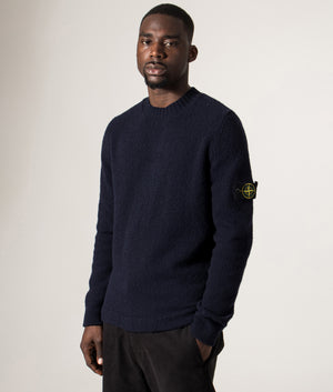Wool Crew Neck Jumper by Stone Island in Navy. Shot by EQVVS. Shot by EQVVS. Front angle model shot.
