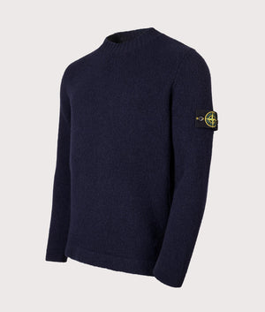 Wool Crew Neck Jumper by Stone Island in Navy. Shot by EQVVS. Shot by EQVVS. Front detail shot.