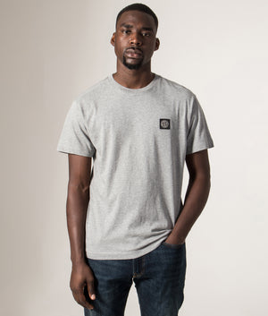 Slim Fit Patch Logo T-Shirt in Dark Grey . 100% Cotton | Stone Island | Shot at EQVVS | Front model shot 