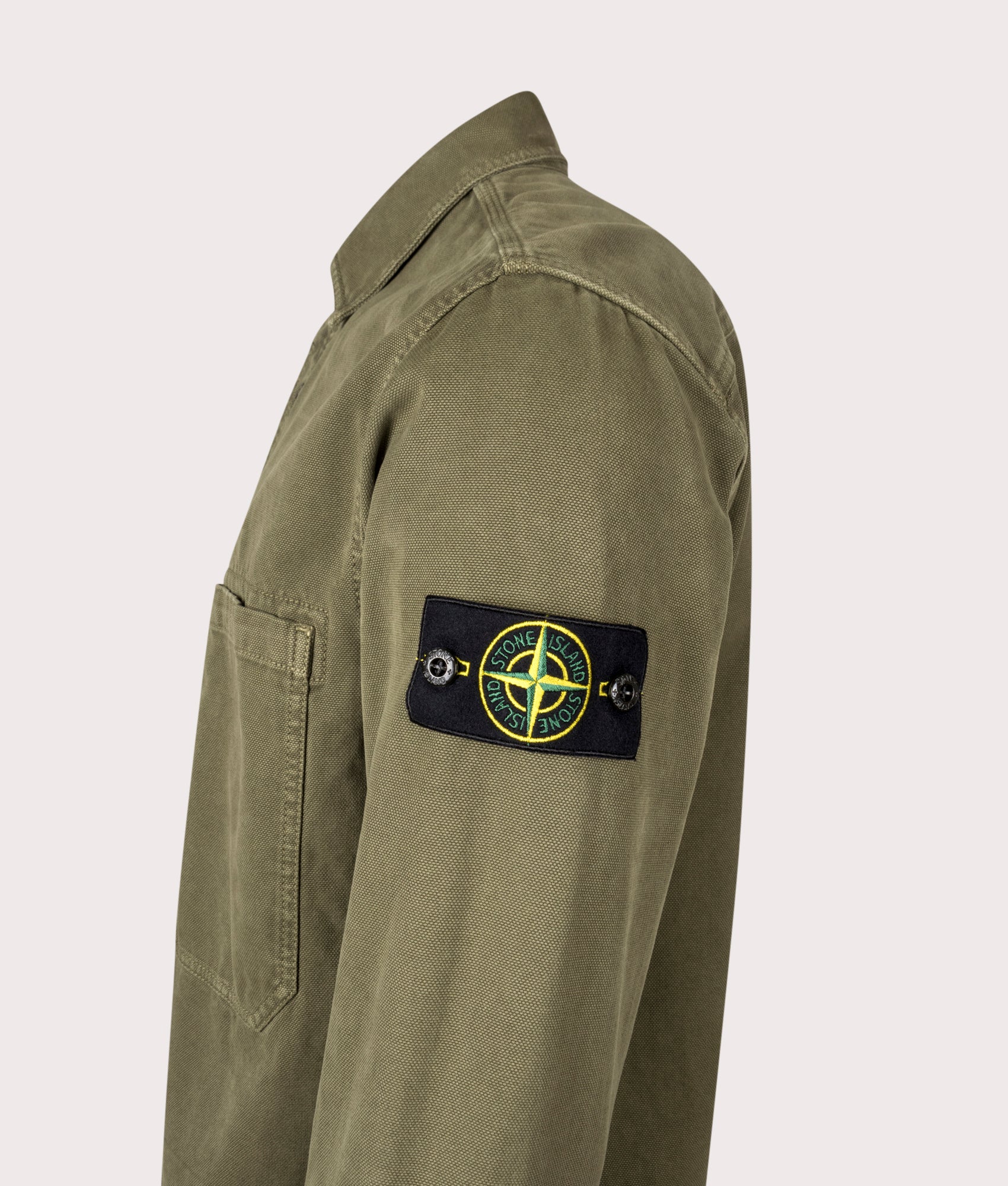 Stone Island Overshirt in Military Green at EQVVS Menswear. Side detail Shot.