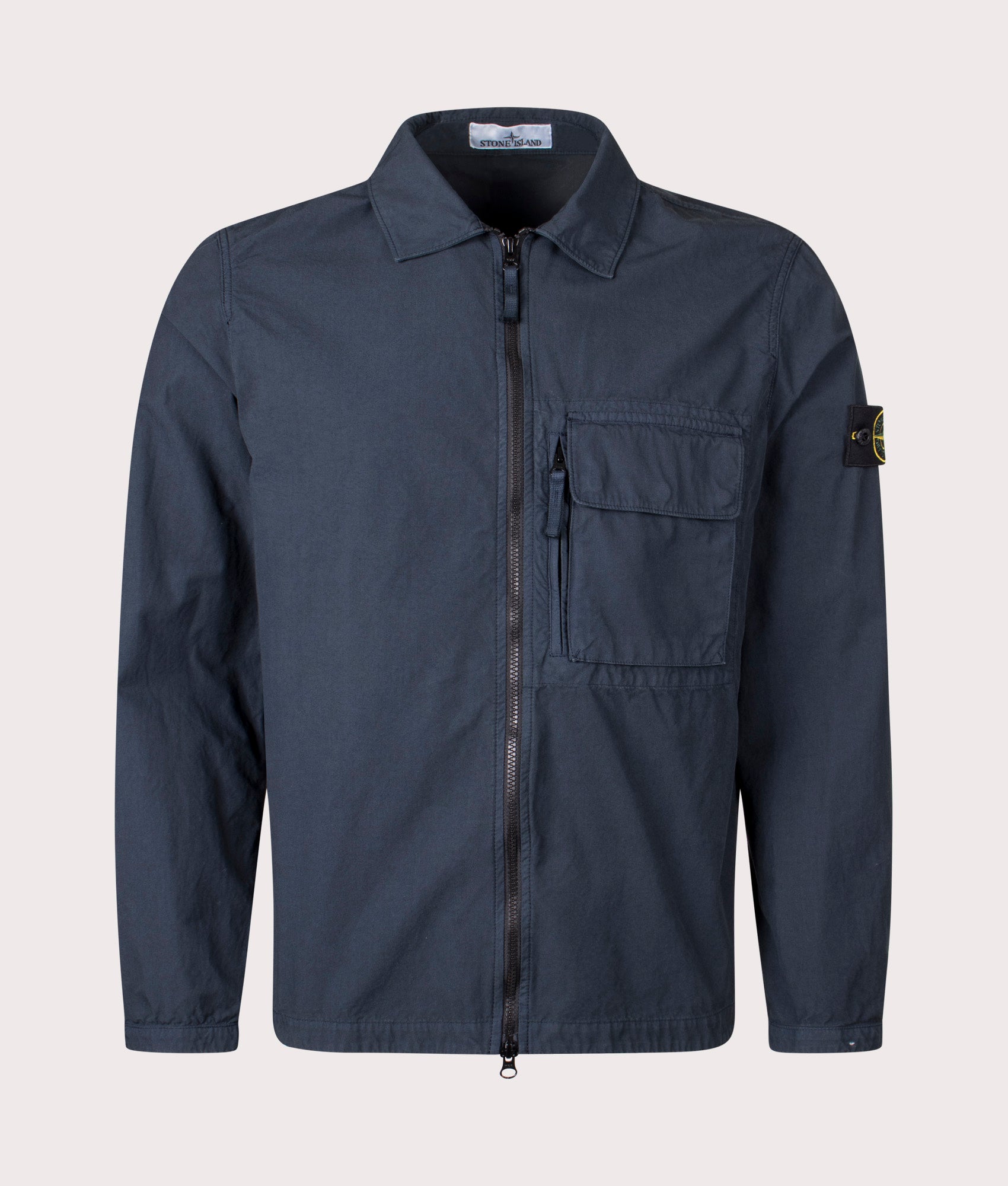 Canvas Weave Overshirt in Navy Blue . 100% Cotton | Stone Island | Shot at EQVVS | Front shot 