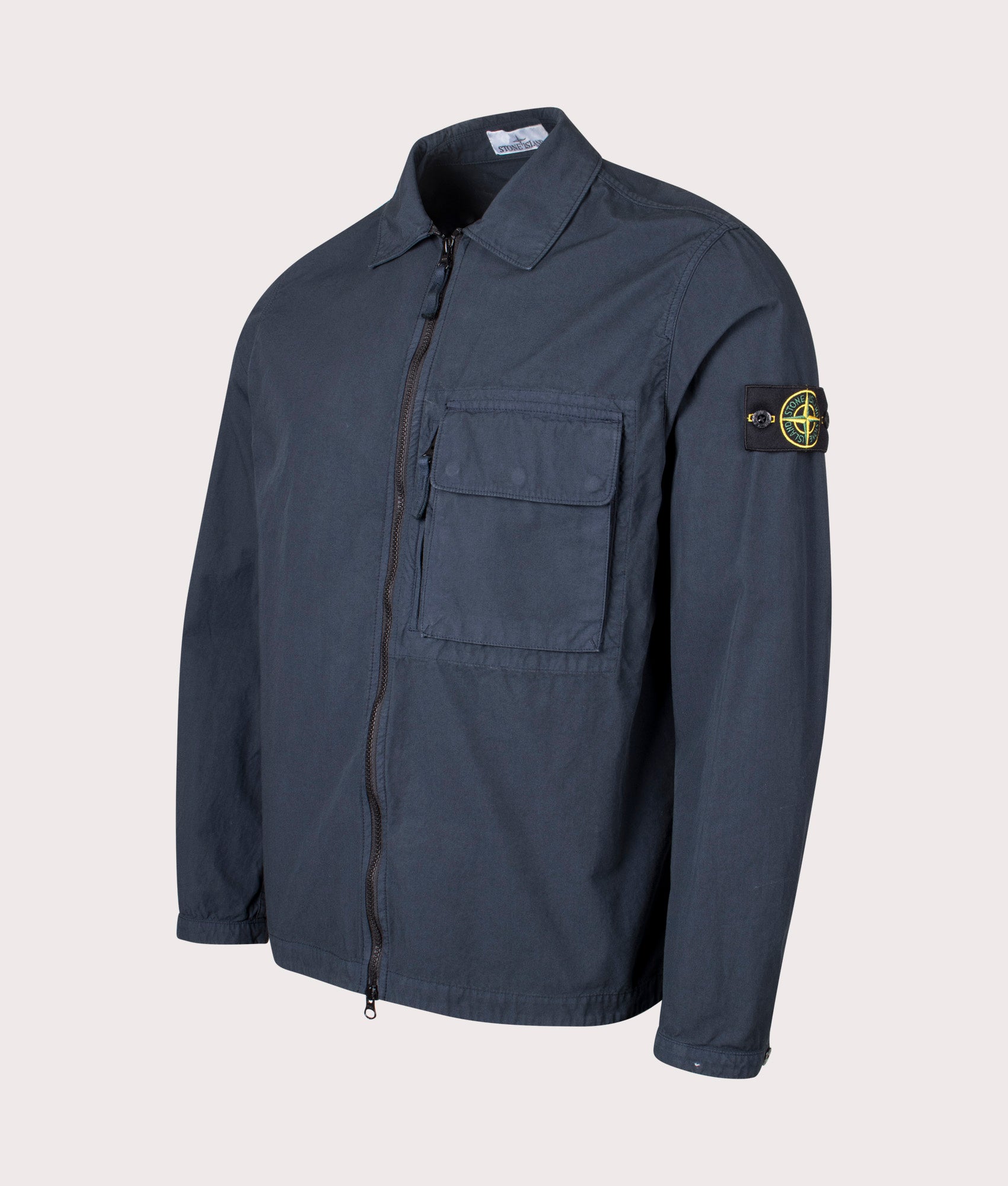 Canvas Weave Overshirt in Navy Blue . 100% Cotton | Stone Island | Shot at EQVVS | Front angle shot 