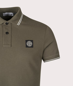 Stone Island Slim Fit Striped Collar Polo Shirt in Military Green at EQVVS Menswear. Detail shot.