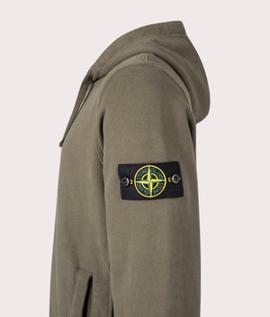 Brushed Organic Cotton Hoodie by Stone Island in Military Green. Shot by EQVVS.  Side detail shot.