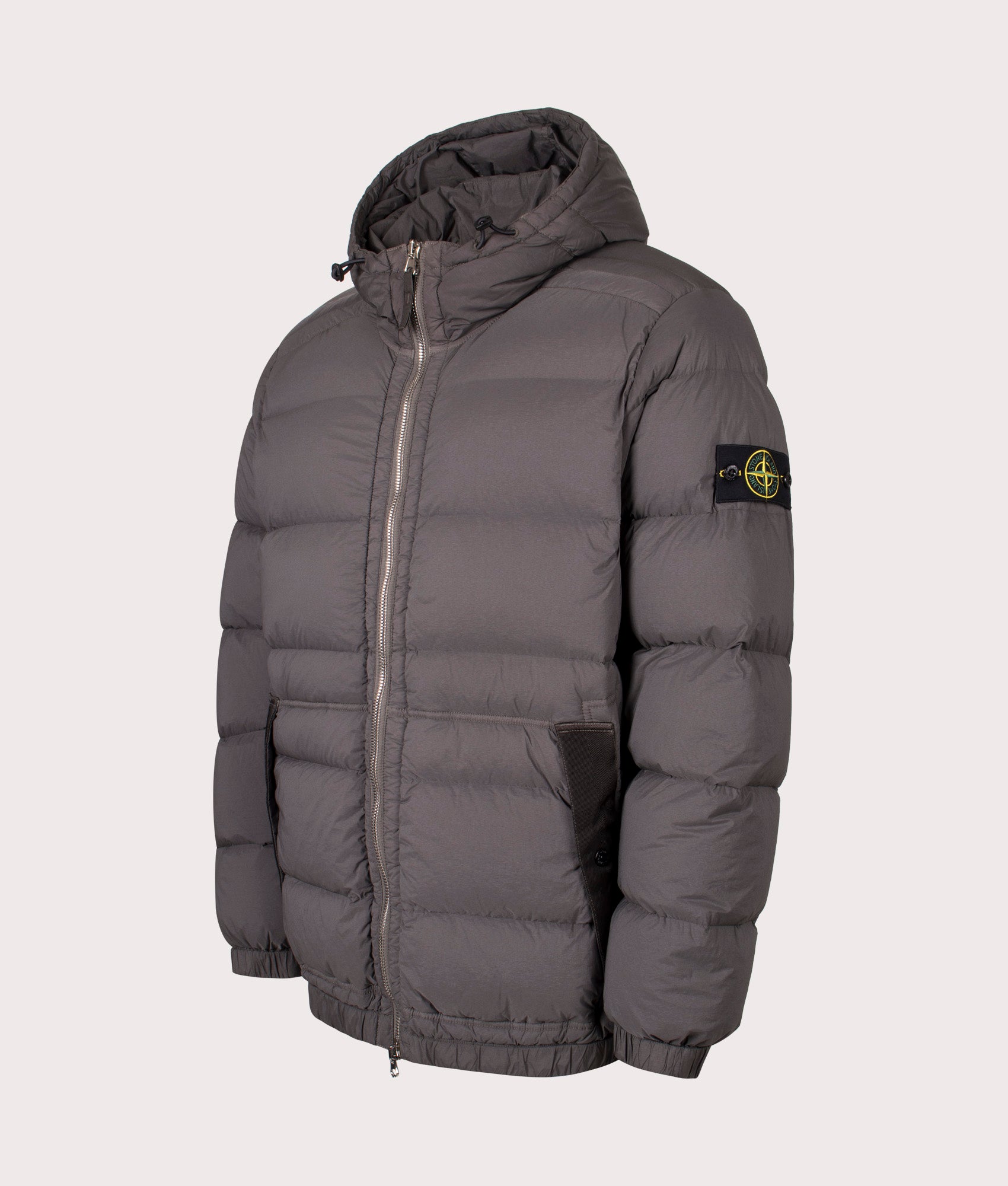 Stone Island Seamless Tunnel Nylon Down TC Jacket in Lead Grey at EQVVS Menswear. Angled front shot.