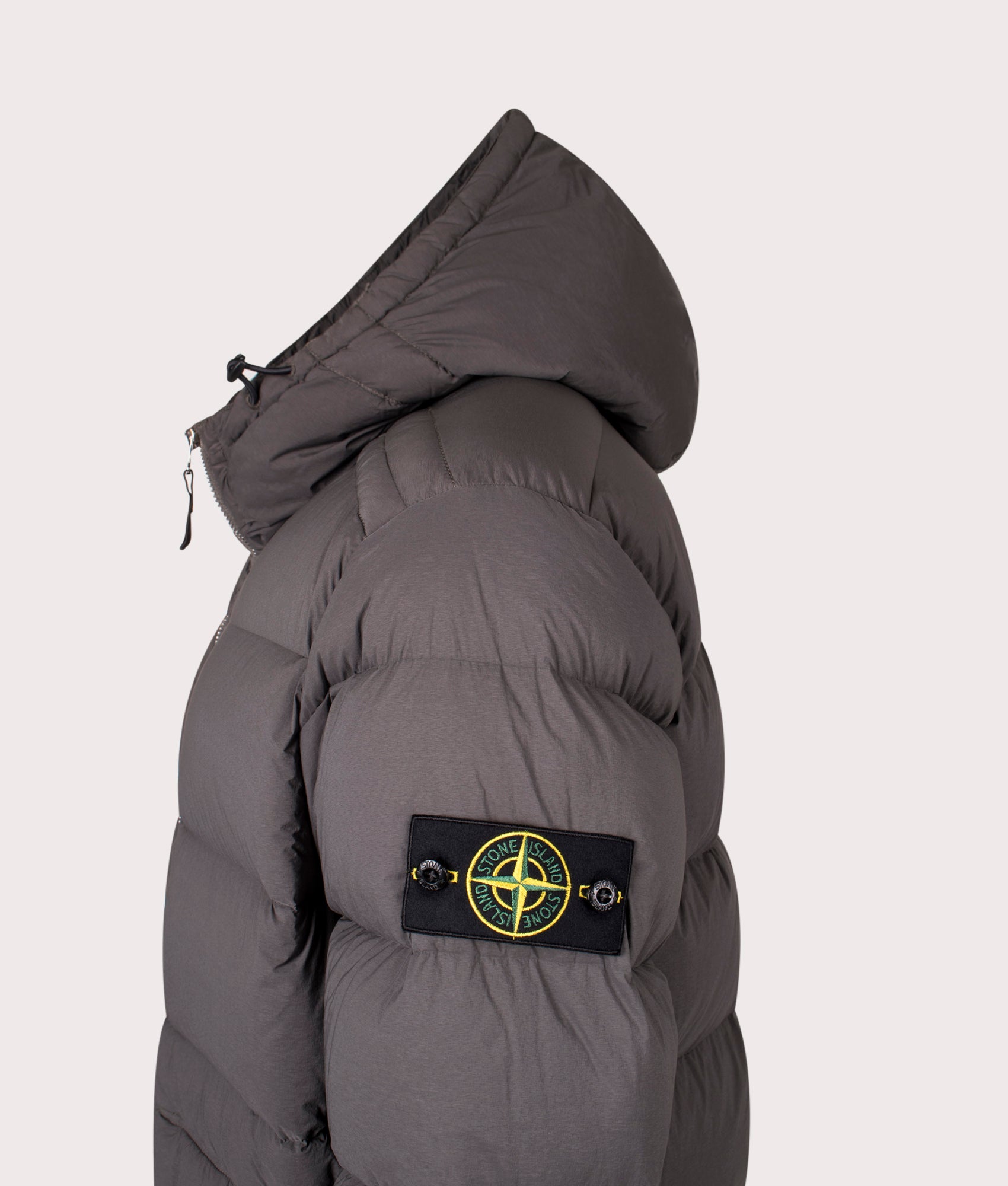 Stone Island Seamless Tunnel Nylon Down TC Jacket in Lead Grey at EQVVS Menswear. Side detail shot.