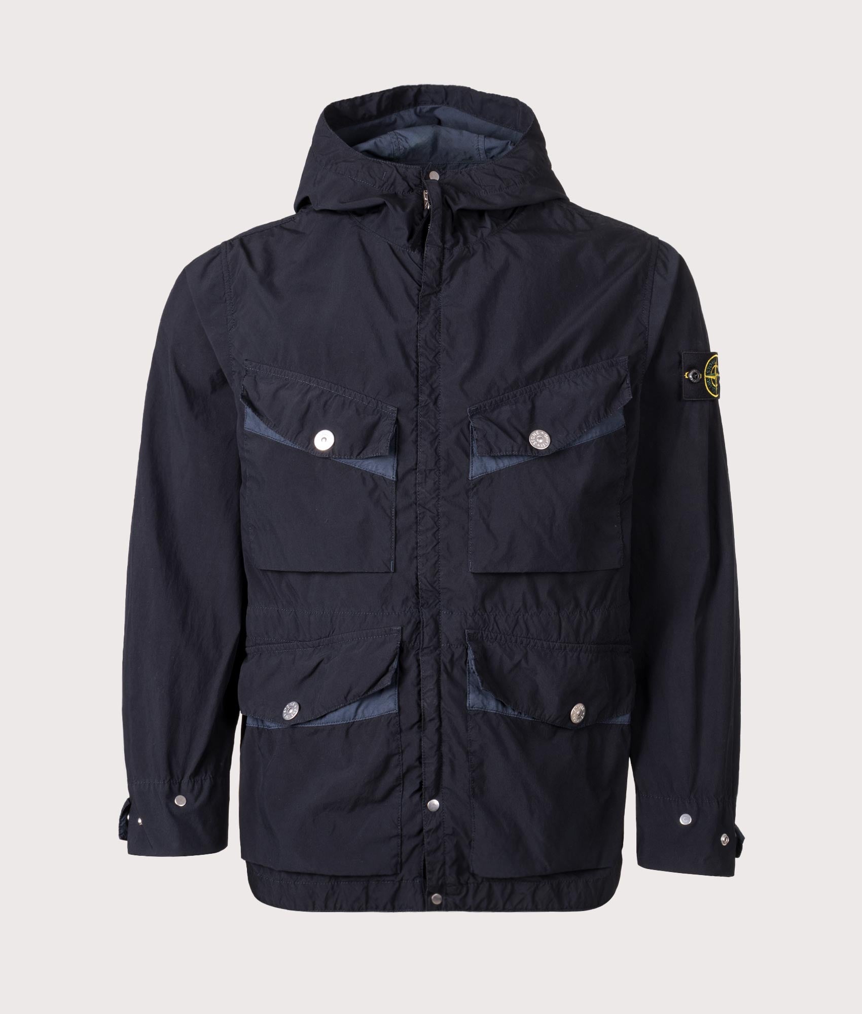 Light Compact Field Parka by Stone Island in Navy Blue. Shot by EQVVS. Front shot.