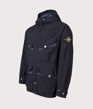 Light Compact Field Parka by Stone Island in Navy Blue. Shot by EQVVS. Front detail shot.