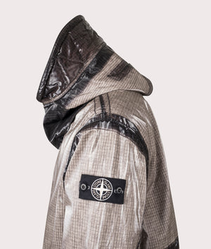 Uneven Ripstop Prismatico Parka in Pearl Grey | Stone Island | EQVVS | Side angle shot 
