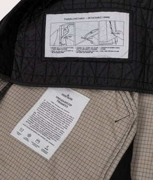 Uneven Ripstop Prismatico Parka in Pearl Grey | Stone Island | EQVVS | Label shot 