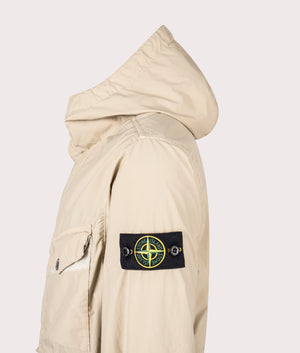 Light Compact Field Jacket by Stone Island in Desert. Shot by EQVVS. Side detail shot.