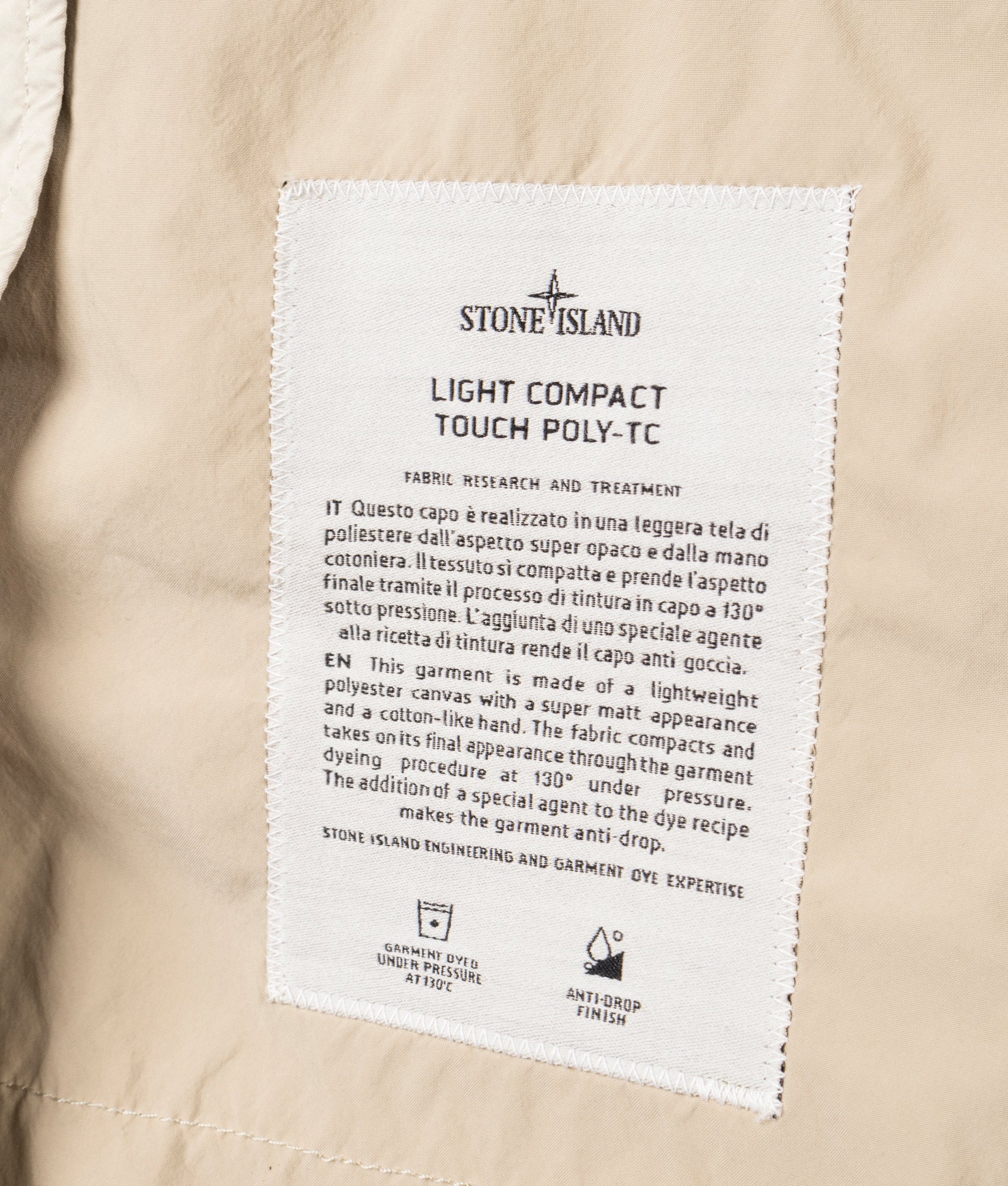 Light Compact Field Jacket by Stone Island in Desert. Shot by EQVVS. Interior shot.