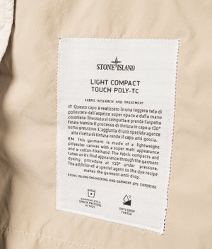 Light Compact Field Jacket by Stone Island in Desert. Shot by EQVVS. Interior shot.