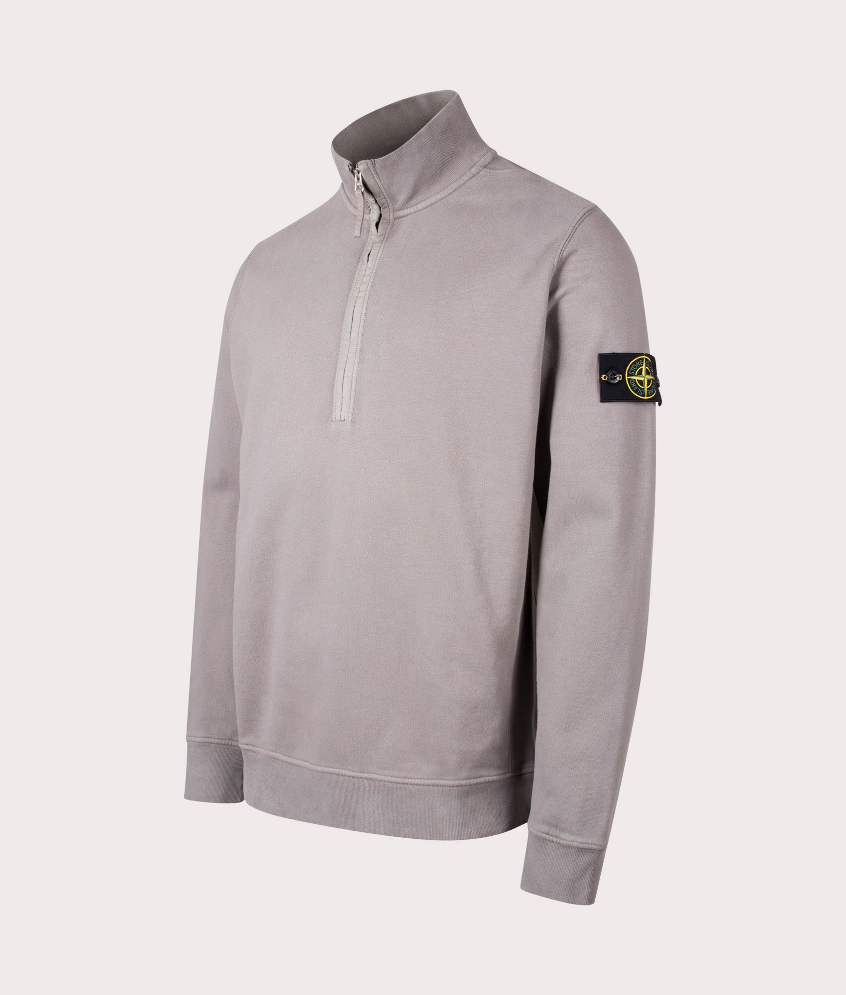 Organic Cotton Quarter Zip in Cement . 100% Organic Cotton | Stone Island | Shot at EQVVS | Front angle shot 