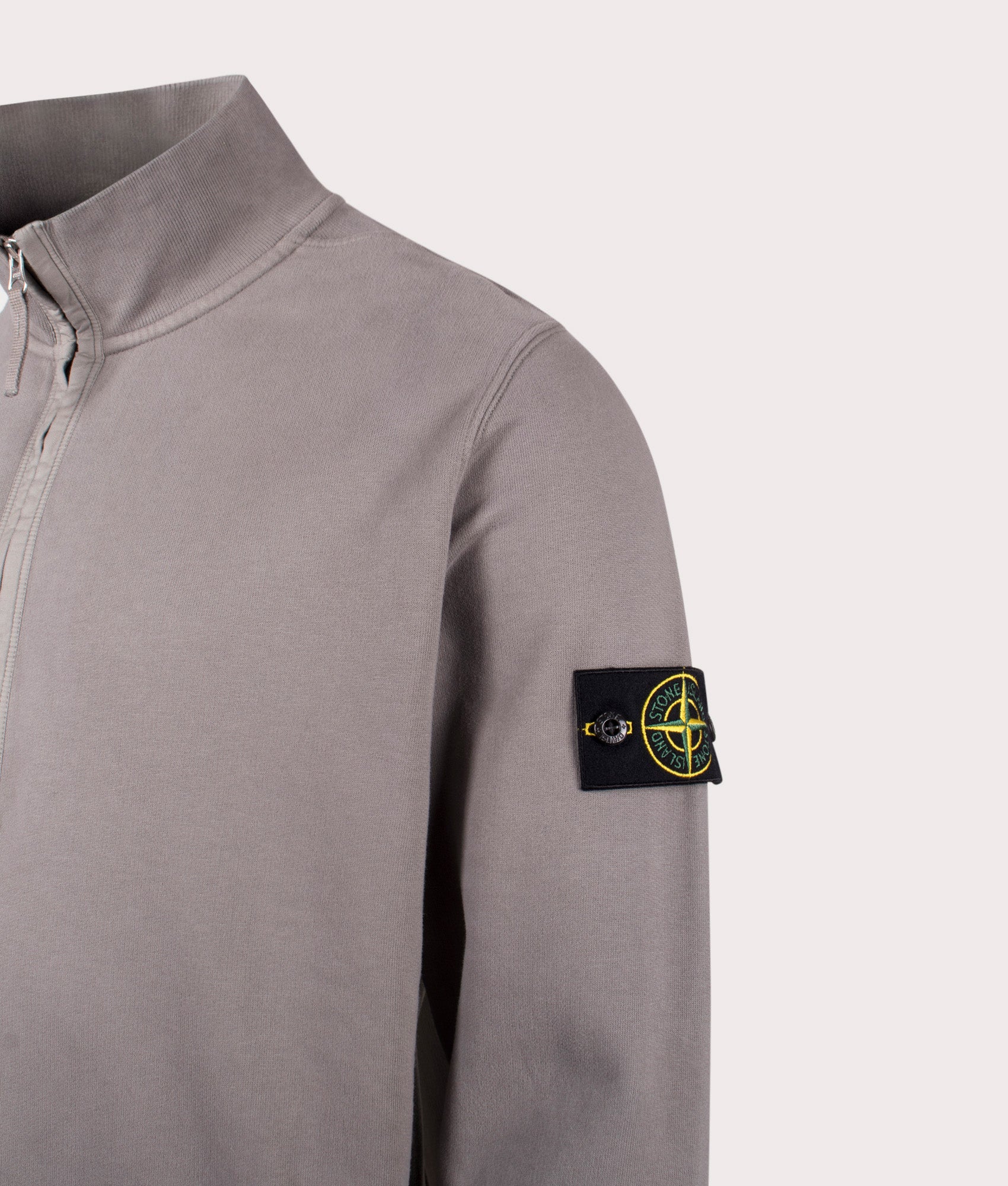 Organic Cotton Quarter Zip in Cement . 100% Organic Cotton | Stone Island | Shot at EQVVS | Front angle detail shot 