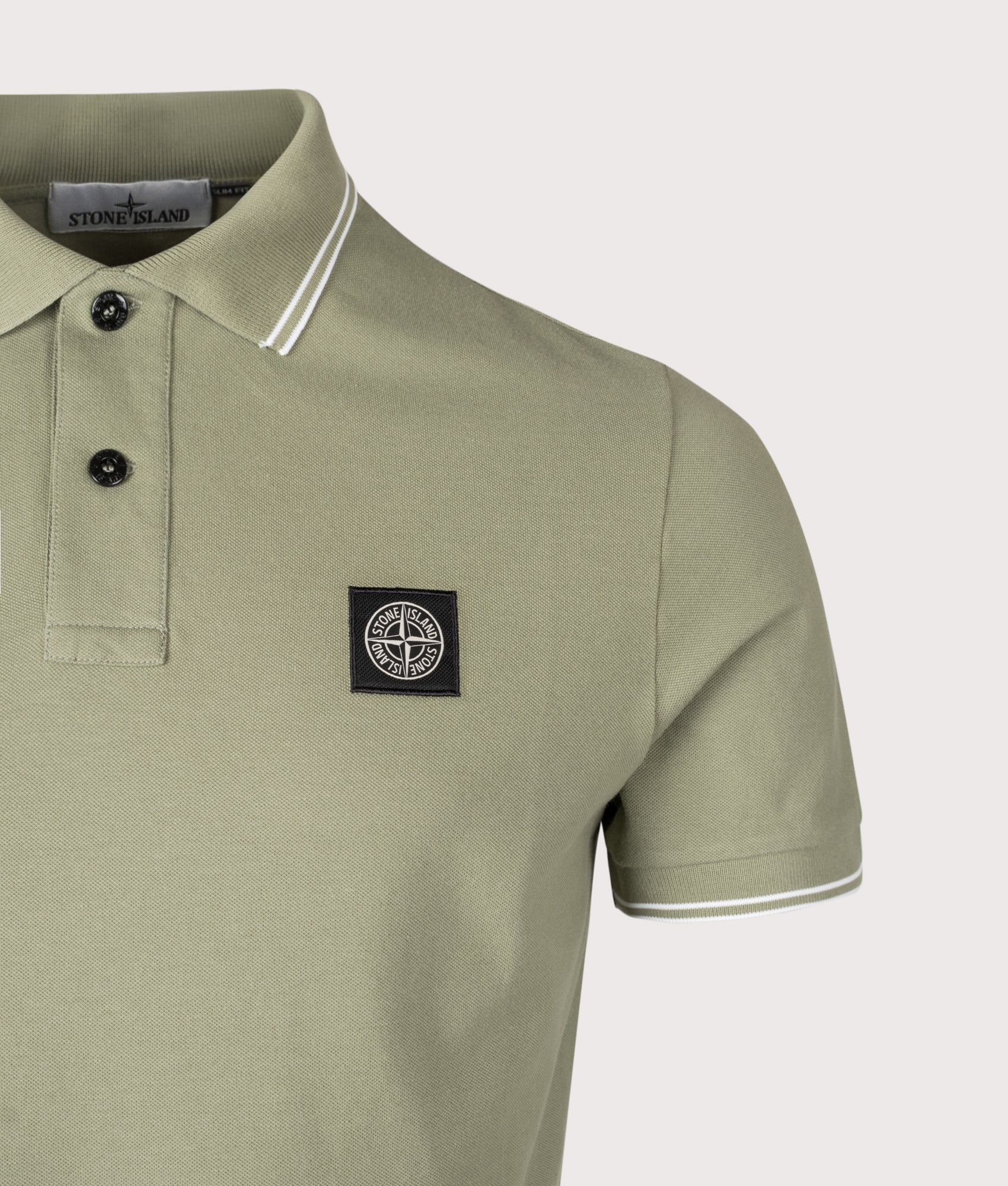 Compass Polo Shirt. Shot by EQVVS. Detail shot.