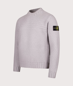 Mock Neck Wool Jumper in Pearl Grey. 100% Wool | Stone Island | Shot at EQVVS | Front angle shot